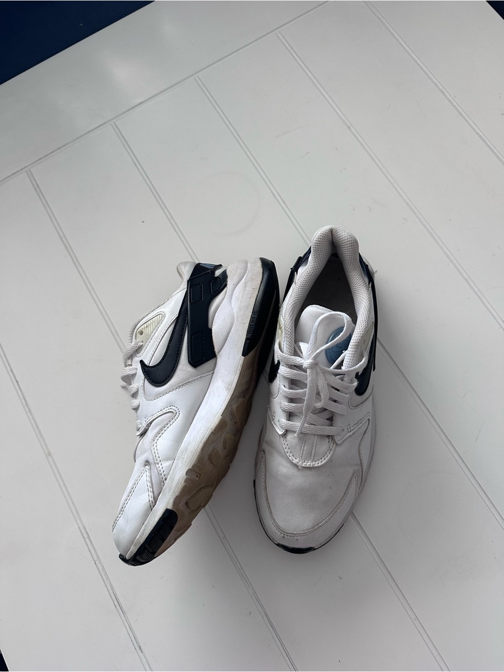 Nike White Sneakers with Black Swoosh Accent - Picture 4 of 5